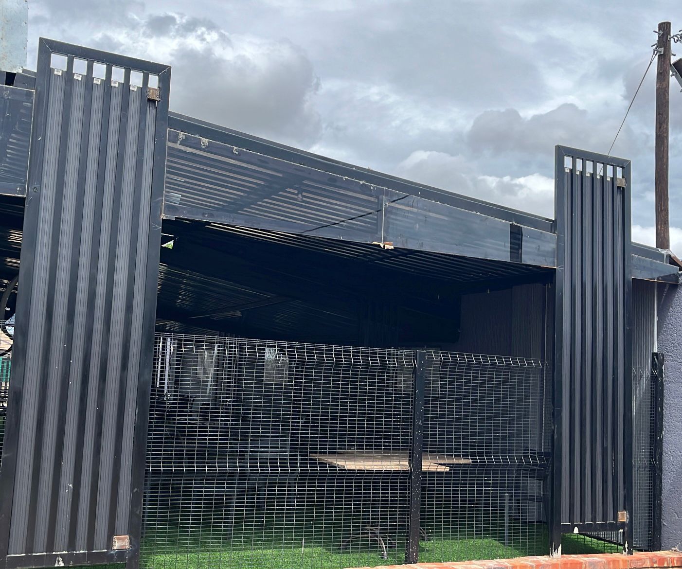 Workers fabricating custom steel components